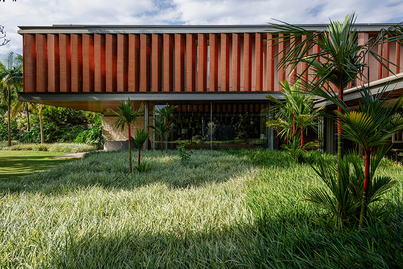 Green Golf Development in São Paulo by Architects Bernardes Arquitetura using Vitrocsa Invisible Frame Sliding Windows.