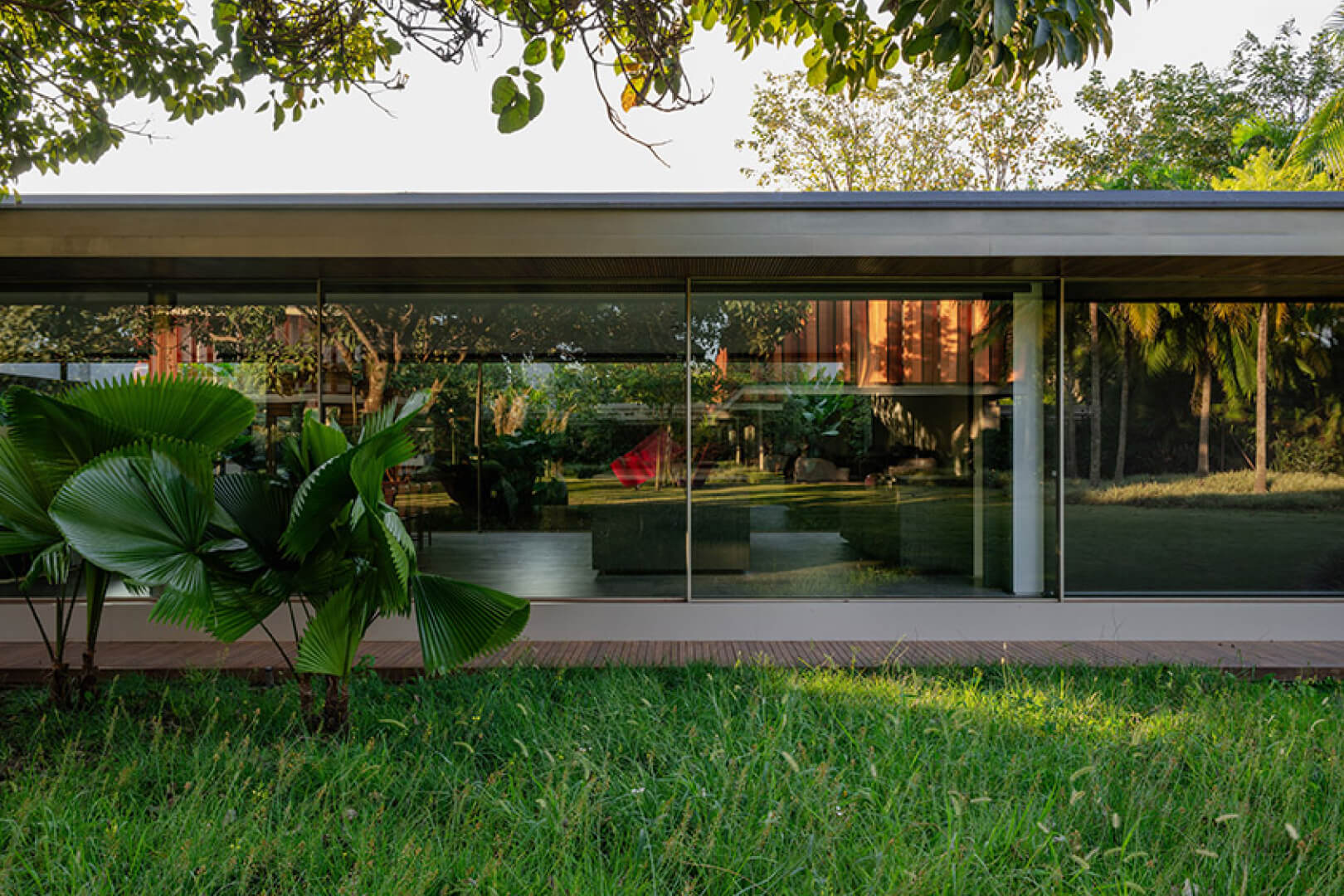Green Golf Development in São Paulo by Architects Bernardes Arquitetura using Vitrocsa Invisible Frame Sliding Windows.