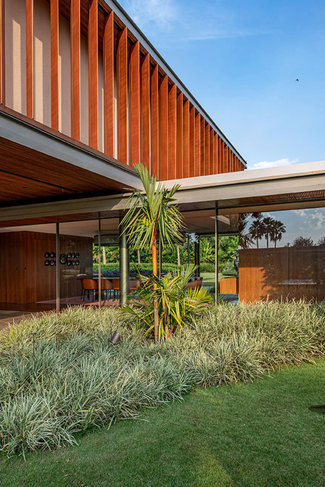 Green Golf Development in São Paulo by Architects Bernardes Arquitetura using Vitrocsa Invisible Frame Sliding Windows.
